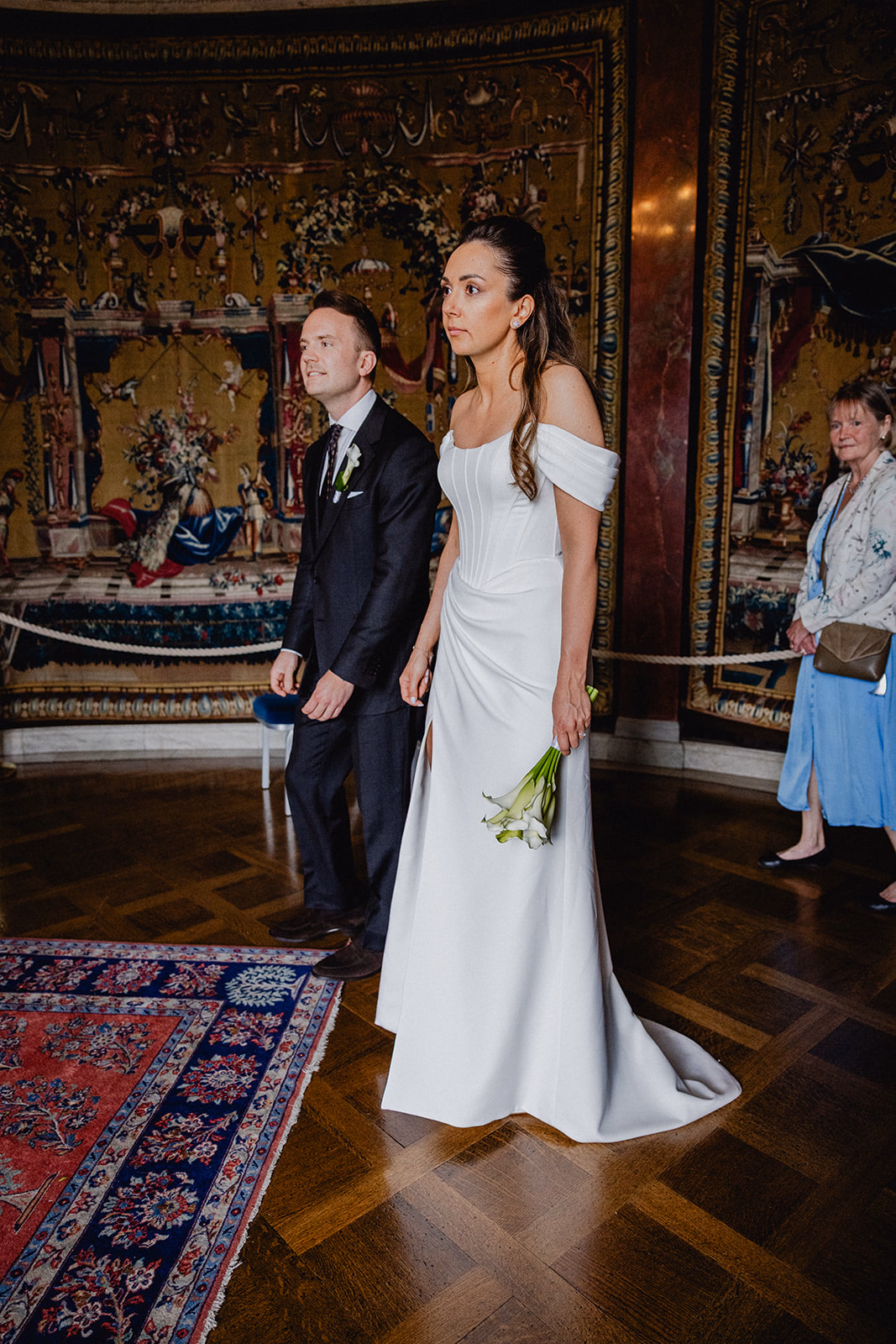 Gintare and Mikael entering the civil ceremony room at Stockholm City Hall.