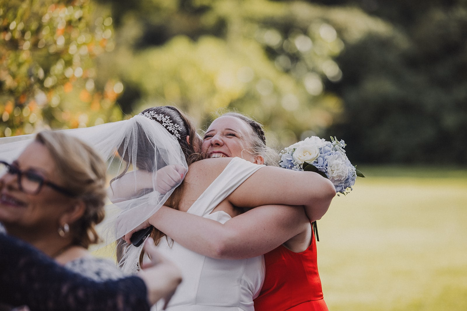 Sara embracing a guest after the ceremony.