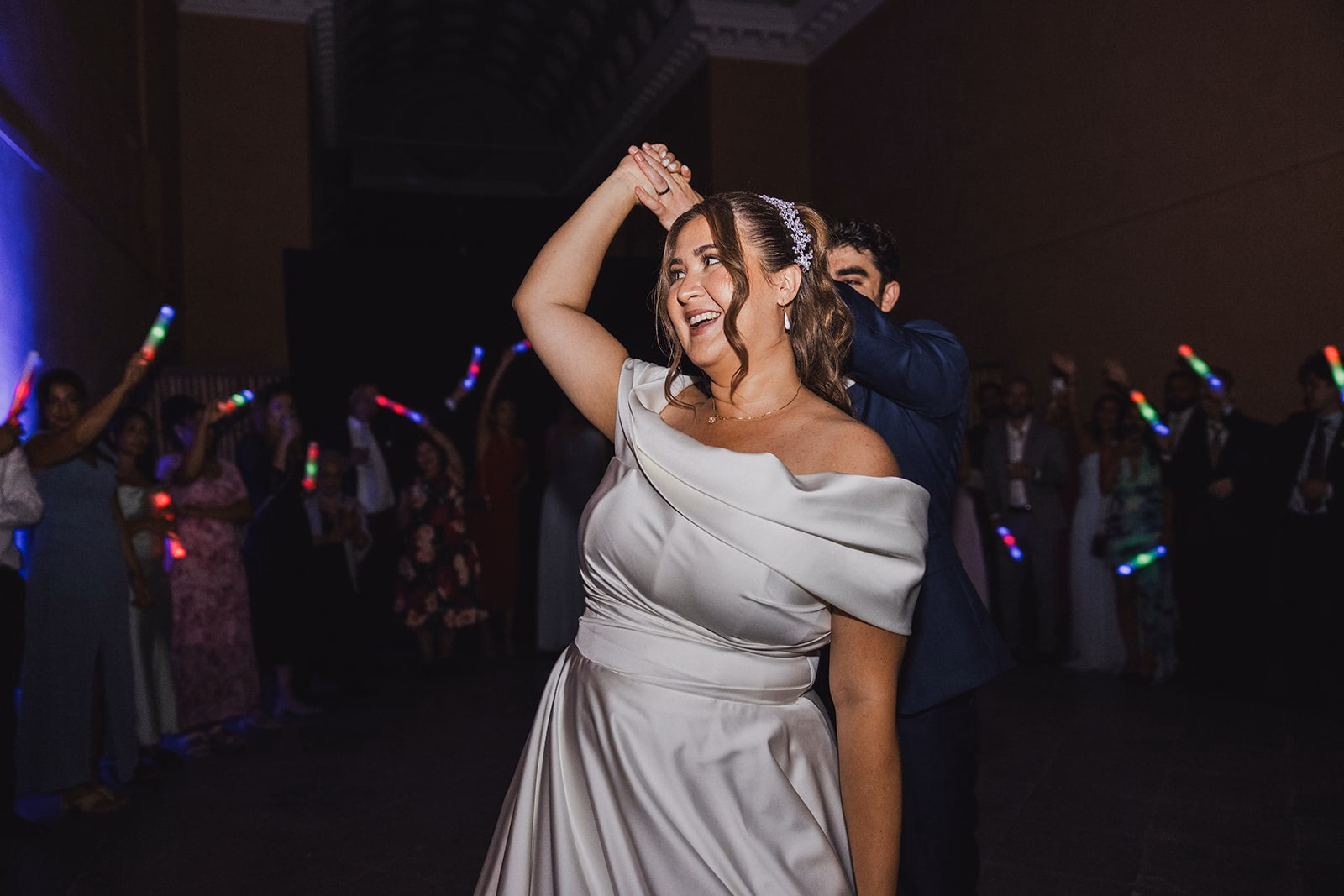 The newlyweds kissing during their first dance.